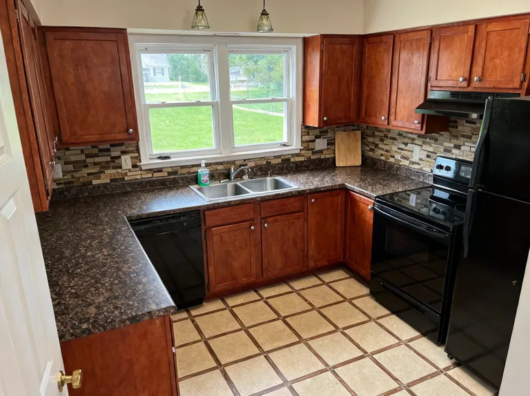 A dated kitchen before its industrial redesign